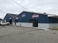 Clio Auto Mall & Wholesale logo