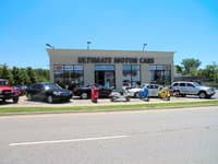 Ultimate Motor Cars logo