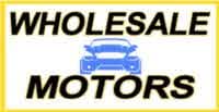 Wholesale Motors logo